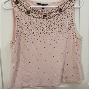 Embellished tank
